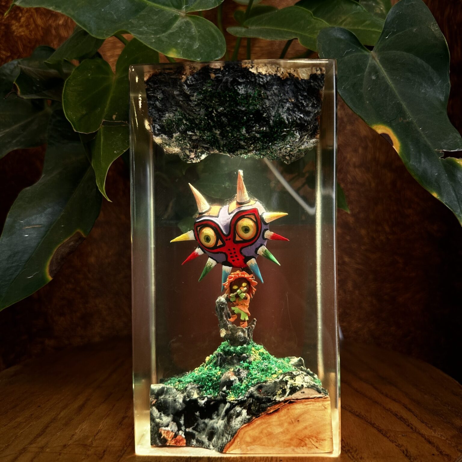 Handcrafted Majora's Mask Resin Lamp glowing in a gaming room, a unique Legend of Zelda collectible.