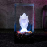 Sexy Ghost Resin Lamp casting a soft, ambient LED glow, ideal for unique home decor and gothic ambiance