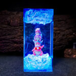 Adorable pink Slowpoke Pokemon plush toy with a white belly, perfect for collectors and fans of the relaxed Psychic Water type.