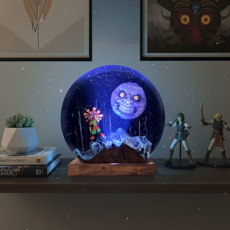 Close-up of a glowing handmade Majora's Mask Lamp, a perfect Legend of Zelda decor item for gamers.