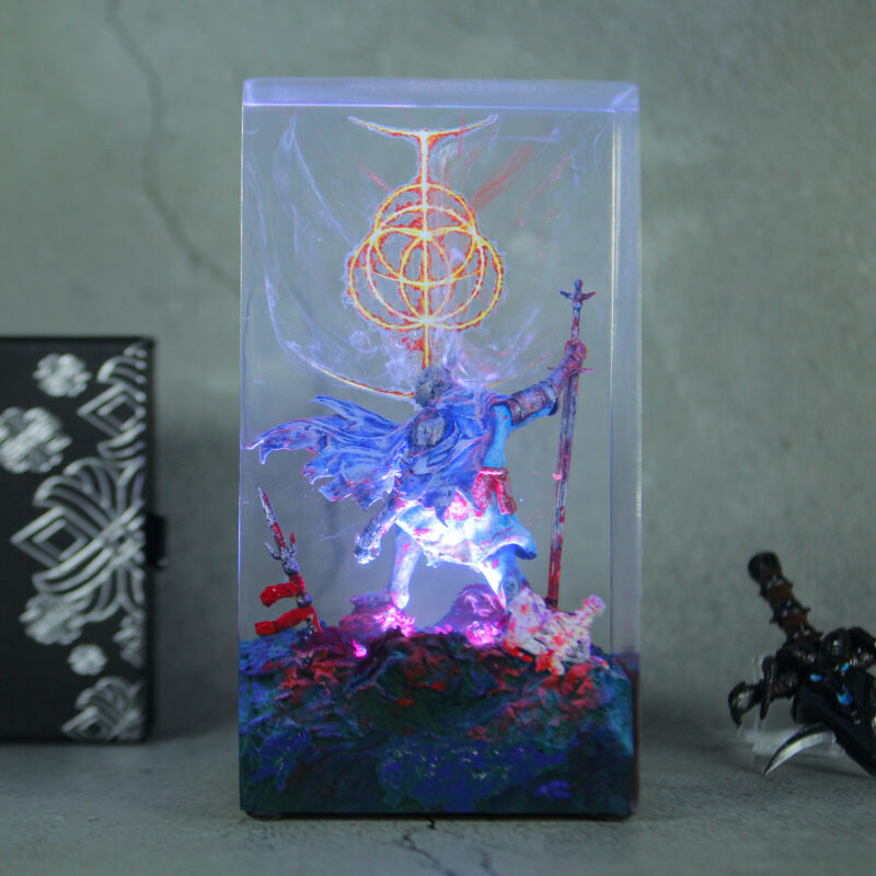 High-quality LED Elden Ring Tarnished lamp illuminating a dark room, showcasing intricate details of the iconic character from the Lands Between.