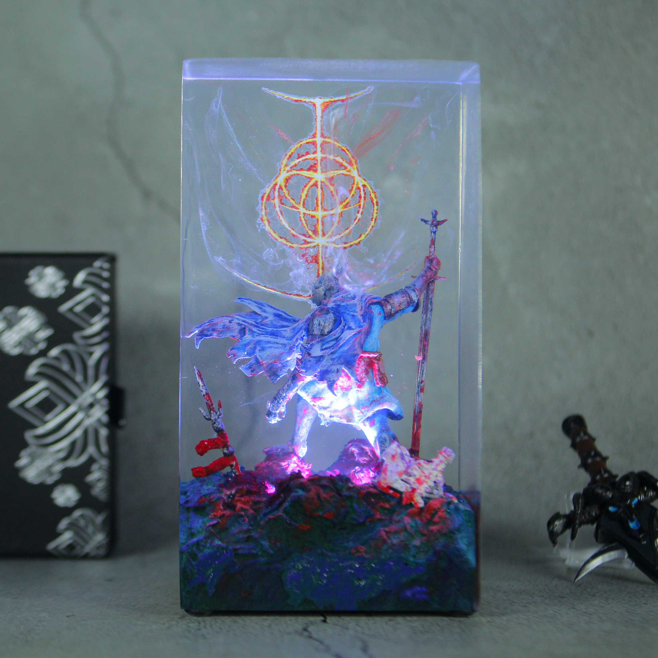 IMG_8922 High-quality LED Elden Ring Tarnished lamp illuminating a dark room, showcasing intricate details of the iconic character from the Lands Between.